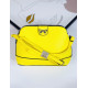 Žlutá dámská kabelka s mašlí a řemínkem