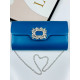 Dámská modrá společenská kabelka s brož